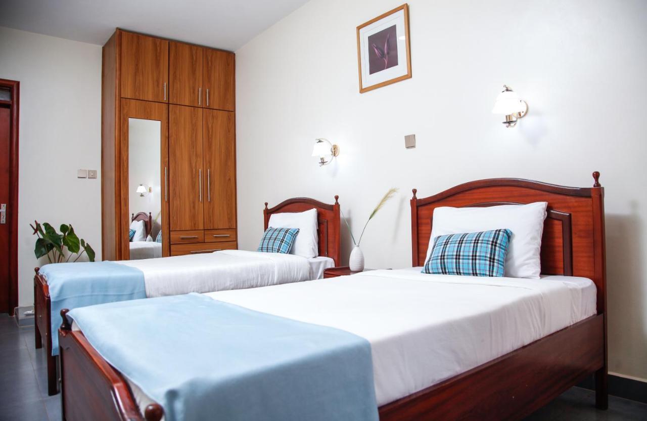 Fred And Winnie Bnb Кампала Экстерьер фото